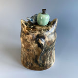 Blue-Eyed Apple Cat Sculpture