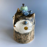 Blue-Eyed Apple Cat Sculpture